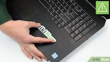 Remove Stickers from a Laptop Step 3