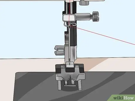 Enhebrar una máquina de coser Singer Paso 10