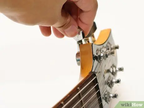 Използвайте Guitar Capo Стъпка 2