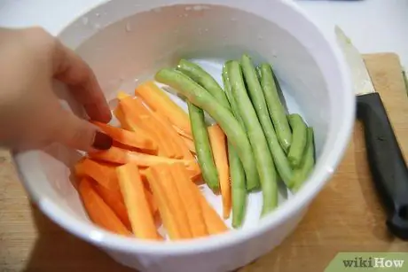 Faire cuire des légumes à la vapeur au micro-ondes Étape 4