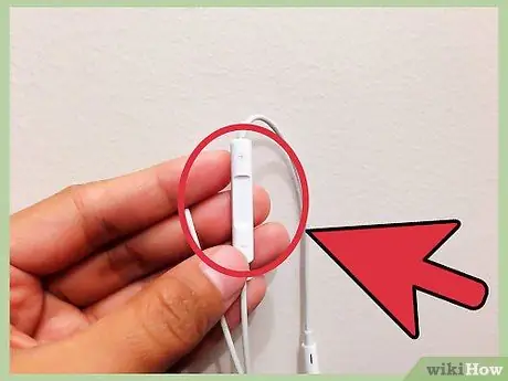 Use los auriculares del iPhone Paso 1